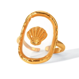 Macro view of gold stainless steel ring featuring a shell inlay and adjustable band