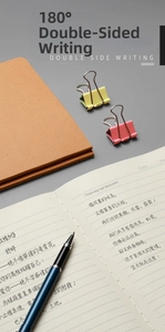 Detail showing 180 degree flat lay writing feature on lined B5 kraft notebook pages