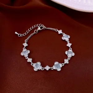 Bracciale a quadrifoglio in argento con zircone blu e catena regolabile su seta