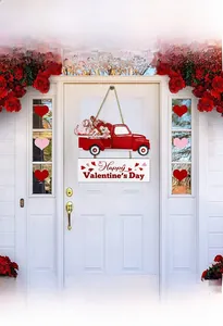 Detail of Happy Valentine's Day wood sign hanging on white door with red truck and hearts