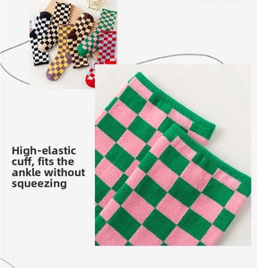 Detail of high-elasticity ribbed cuff on checkerboard socks for a comfortable fit
