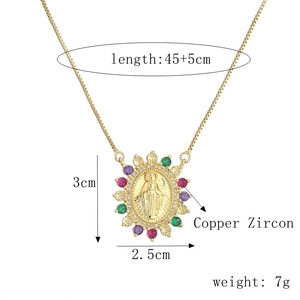 Detail view of gold Virgin Mary pendant with colorful zircon stones and measurements