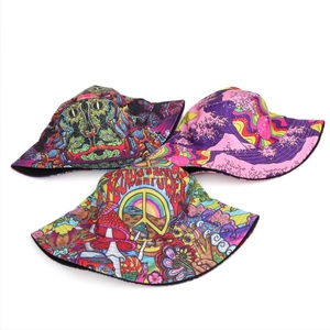 Three assorted graffiti reversible bucket hats with psychedelic art and flower power prints
