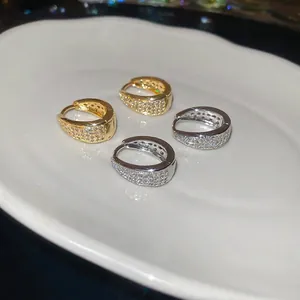 U-shaped hoop earrings with pave-set zircons in gold and silver finish for women