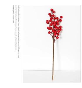 Close-up of artificial bright red berry branches with high imitation texture and detail