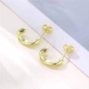 Elegant 18K gold-plated C-shape twisted hoop earrings in minimalist geometric style