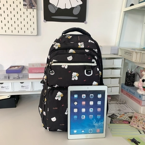 Minimalist black backpack with cute bear print and large capacity for students