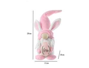 Dimensions détaillées d'un gnome de Pâques rose tenant un œuf décoratif avec love