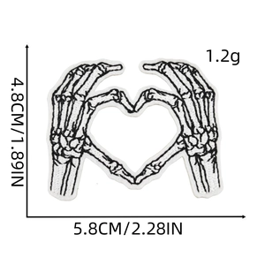 Skeleton heart hand embroidered patch in black and white with size and weight metrics