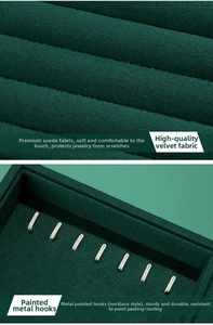 Detail of dark green velvet jewelry tray featuring durable painted metal necklace hooks