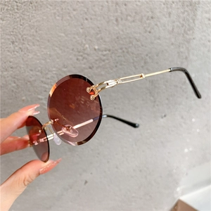 Lunettes de soleil ovales sans monture pour femmes avec verres dégradés marron