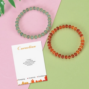 Beaded Carnelian and Aventurine bracelet set with gold spacers and energy card