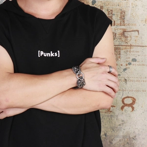 Punk men's lion head leather bracelet and ring set with industrial style background