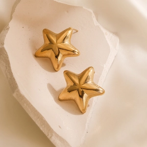 Minimalist 18K gold plated stainless steel star stud earrings on aesthetic background