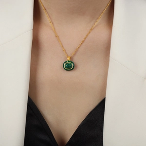 Retro palace style gold-plated titanium steel necklace with green malachite pendant