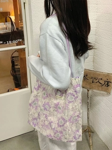 Floral purple lace tote bag with delicate embroidery and slim straps for daily use