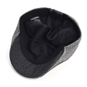 Black and white herringbone ivy cap with 30% wool blend and inner lining detail