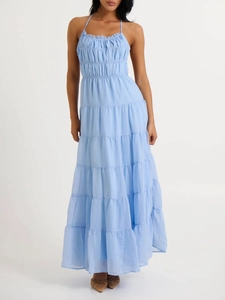 Detail of light blue halter neck maxi dress with tiered ruffle layered cake skirt design