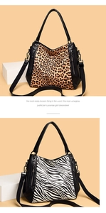 Detail of leopard and zebra print panels on large leather tote bags with wide straps