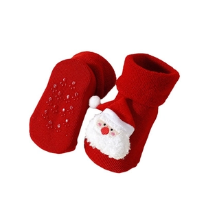 Thick red Christmas baby floor socks with anti-slip silicone dots and 3D Santa Claus
