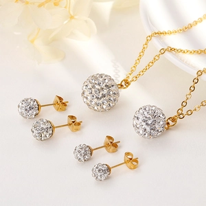 Detail of gold titanium jewelry set featuring crystal paved spherical beads and necklace