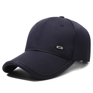 Navy blue twill baseball cap with silver metal side plate in a 45-degree side view