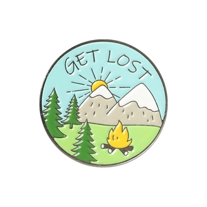 Scenic circular enamel brooch badge featuring 'GET LOST' text for outdoor travel style