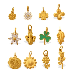 Set of 12 gold floral pendants including clover and cactus shapes for jewelry making
