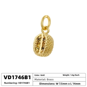 Detailed close-up of a gold durian fruit pendant with cubic zirconia on brass base