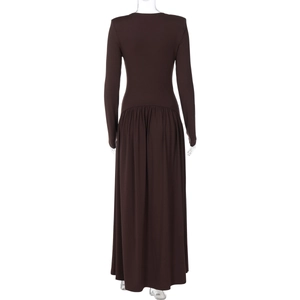 Detail of the back view showing the slim fit waist and flowing chocolate maxi dress