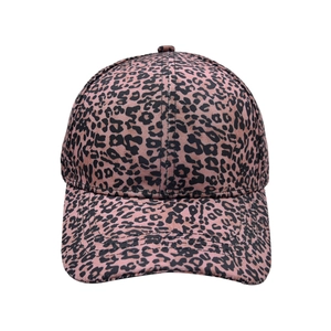 Close-up of pink and black leopard print pattern on durable canvas baseball cap