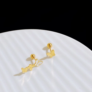 Elegant butterfly stud earrings in gold with white enamel and secure screw ball backs