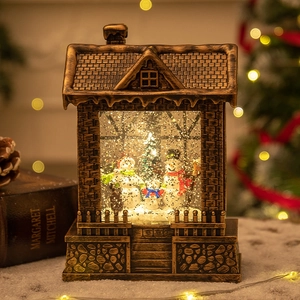 Vintage bronze snow globe lantern with snowman family and rotating glitter sparkles