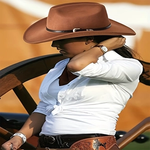 Classic brown wide-brim western cowboy hat with leather belt in vintage American style