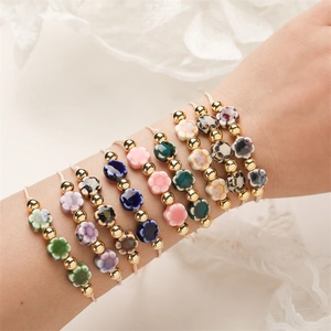 Ceramic Flower Beaded Bracelet With Metal Beads Adjustable Braided Cord Bohemian Style Jewelry For Women And Men