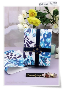 Detail view of 80g blue and white art paper for gift wrapping with especially for you text