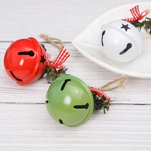 Three metal Christmas bells in red, green and white with plaid ribbons for tree decor