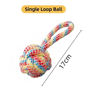 Detail view of the 17cm multicolored cotton rope ball toy with single-loop handle for dogs