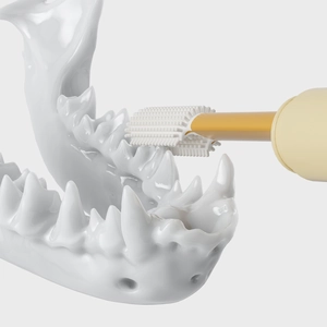 U-shaped silicone pet toothbrush with yellow handle for effective dog and cat dental care