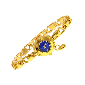 Detailed macro shot of the golden heart-shaped strap and blue dial of this quartz watch