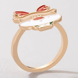 Detailed view of Christmas reindeer alloy ring with colorful enamel on a grey stone base