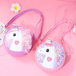 Cute kids unicorn sequin shoulder bags in bright pink and rainbow colors with horn detail