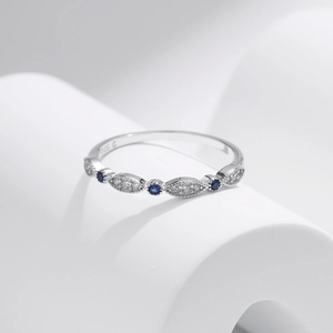 Elegant S925 sterling silver ring with alternating blue and white zircon stones