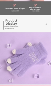 Detail of purple winter knit gloves with white fingertips and CUTE GIRL embroidery