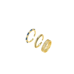 Set of three vintage golden adjustable rings featuring blue gems and mesh grid design