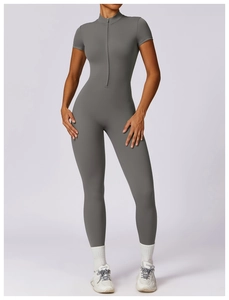 Front zipper detail on gray short sleeve yoga jumpsuit for fitness and sports