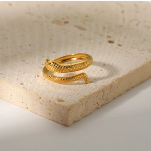 Detailed view of 18K gold plated snake ring showing intricate scale texture on stone
