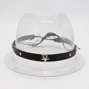 Detail of black leather hat band with silver star studs and metal rivets on display