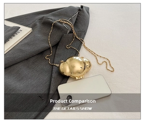 Mini gold metallic shell bag compared with smartphone showing the compact portable size