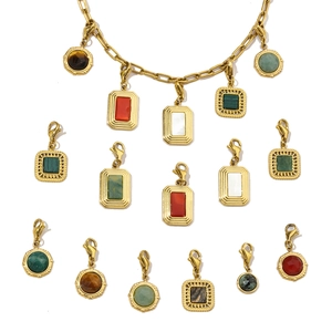 Detailed view of gold stainless steel chain with assorted natural stone charm pendants